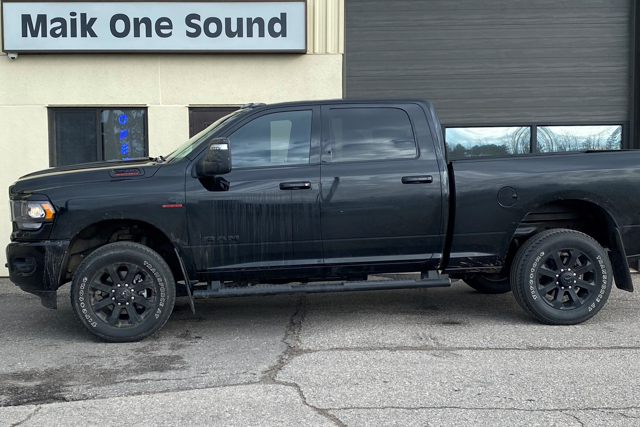2023 RAM 2500 with professional window tint in North Bay